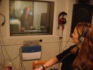 Student and clincian in audiology sound booth
